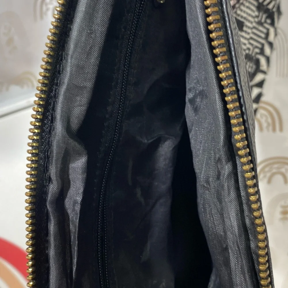 Geometric Black and White Clutch with Pink Tassel